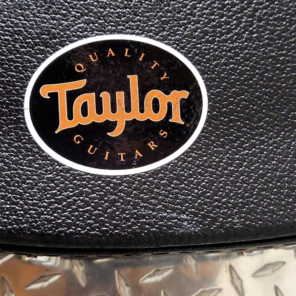 Taylor guitar with gator case